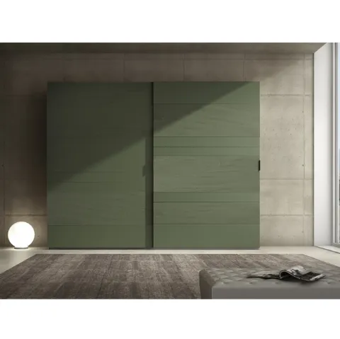 Armadio laccato opaco verde prussia con inserti in cemento Comp 06 di Voltan