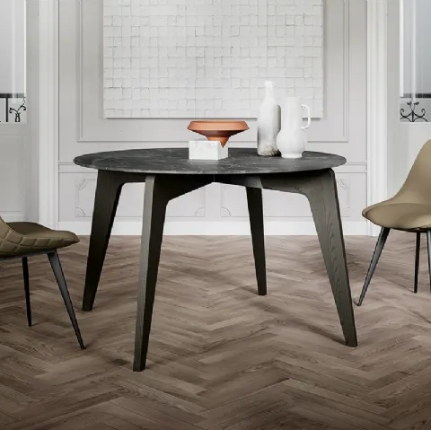 Tavolo rotondo Magic con top in laminato e gambe in massello di Frassino verniciato di Arredo3
