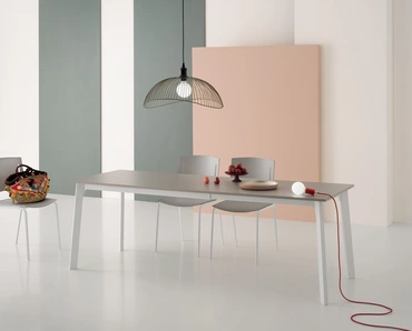 Tavolo allungabile Krono Piano Angoli 90 con top in laminato e base in metallo di Pointhouse